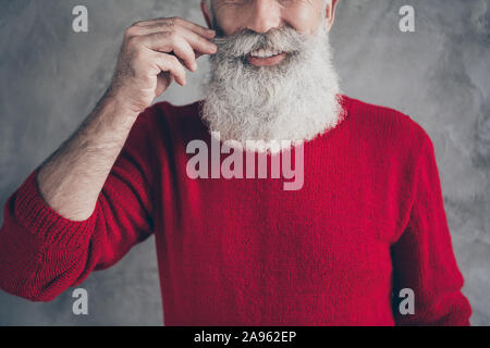 Cropped photo of aged guy touch fingers perfect groomed long beard moustache salon styling wear red knitted jumper hipster outfit isolated grey color Stock Photo