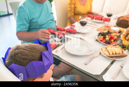Australian family Christmas celebration starts with family dinner and crackers Stock Photo