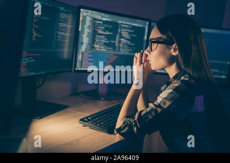 Photo of serious concentrated smart clever developer writing code for new video game to be released soon having to complete deadlines till morning Stock Photo