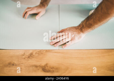 Craftsman Installing Laminate Flooring In New Apartment Stock