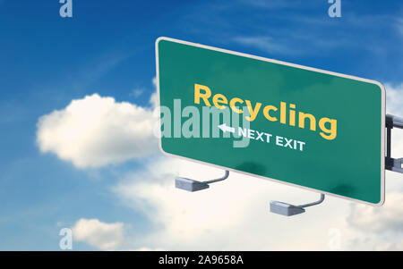 Recycling text on 3D highway road sign against a blue sky with cloudscape. Realistic scene with copy space. Stock Photo