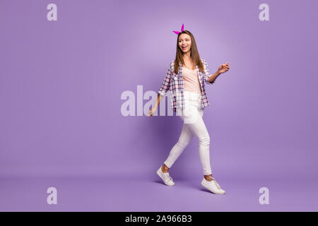 Full length body size view of her she nice attractive lovely charming cheerful cheery feminine straight-haired girl walking spending weekend isolated Stock Photo