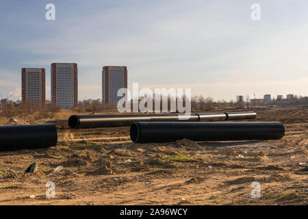 Industrial plastic pipe. Large-diameter black polypropylene pipes for trunk networks of pressureless and pressure sewer and wastewater systems. Stock Photo