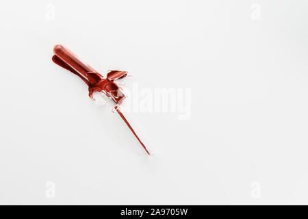 Broken borosilicate glass test tube with blood isolated on white background. Laboratory, analysis, accident, biohazard, medicine and danger concepts Stock Photo
