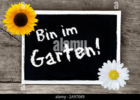 Chalkboard  Bin im Garten   In the Garden Stock Photo