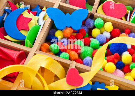 Colorfull accessories in a wooden box Stock Photo