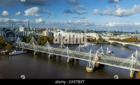 Hungerford Bridge and Golden Jubilee Bridges. Charing cross station there is left side. Stock Photo