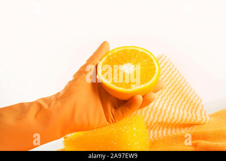 Cleaning products and orange fragrance on white background Stock Photo