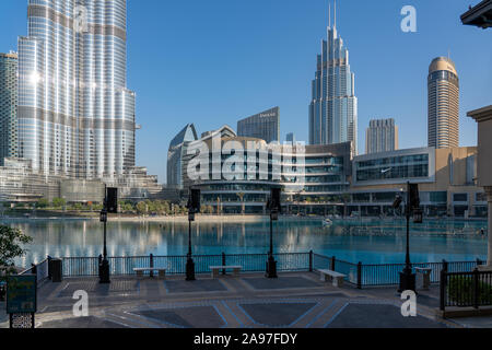 View of the Dubai Mall and base of the Burji Khalifa from the steps off the Souk entrance overlooking the fountains. Stock Photo