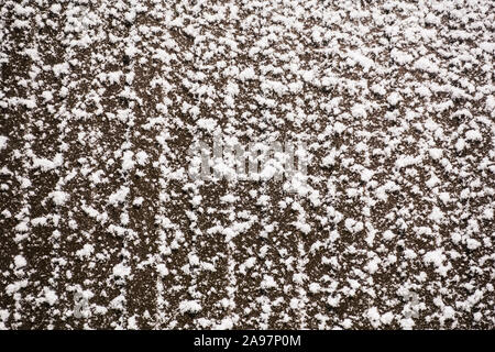 Winter snow background. Fresh white snow on wall. Stock Photo