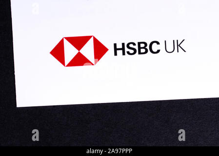 London, UK - March 7th 2019: The logo for HSBC bank pictured on the corner of an information leaflet. Stock Photo