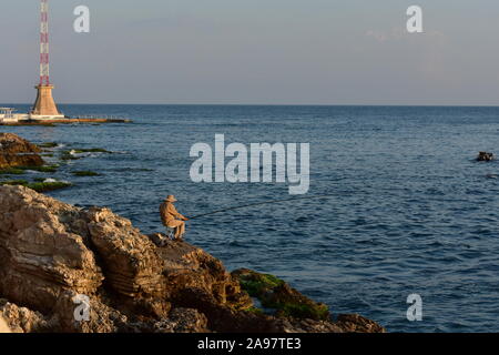 Fisherman in the early morning in Beirut, Lebanon Stock Photo