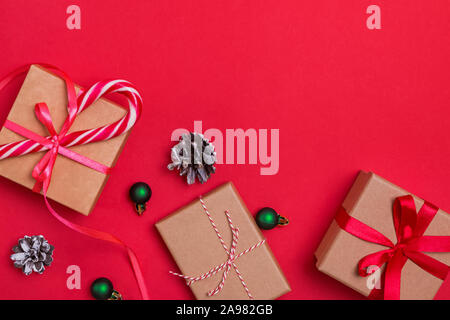 Christmas flat lay with gift boxes and pine cones Stock Photo