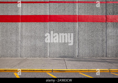 Sidewalk with concrete wall, urban background. Stock Photo