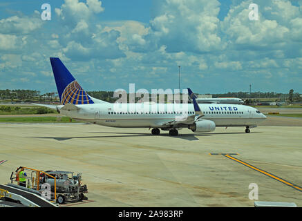 United Airlines Boeing 737-900 N37420 taxying on the apron. Stock Photo