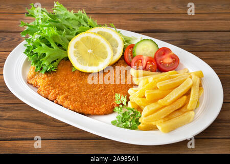 Cutlet and Potato Chips Stock Photo