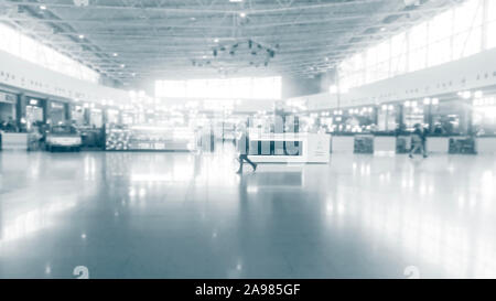 Abstract blur shopping mall store interior for background Stock Photo