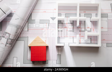 Residential building project architectural design, blueprint plans and house model, top view Stock Photo