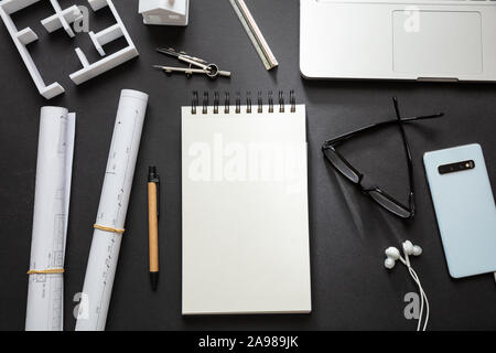 Architect engineer office desk. Residential building project in black and white, top view Stock Photo