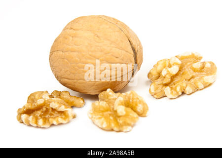 Walnuts against white background close up Stock Photo