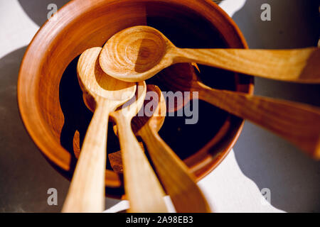 Disposable tableware from natural materials, wooden spoon, fork, knife, eco-friendly. Place for text Stock Photo