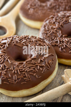 Baking chocolate donuts Stock Photo