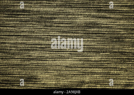Painted canvas in mixed dark pistachio color, sackcloth or burlap with large visible texture. Close up of jute, texture pattern for vivid background Stock Photo