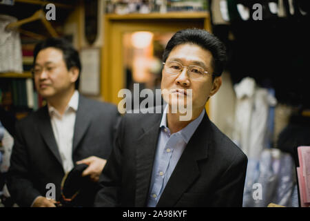 Portrait of a mid-adult businessman inside a store. Stock Photo