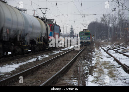 Predeal/Romania/ january 28, 2019: Two crossing Iron old trains in the winter in Romania at the mountains Stock Photo