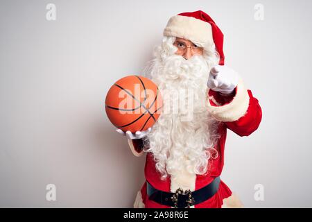 Santa claus ready to play basketball sport for Christmas Stock Photo - Alamy