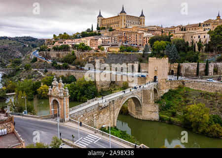 Alcazar across the Alcantara Bridge, Toledo, Spain Stock Photo