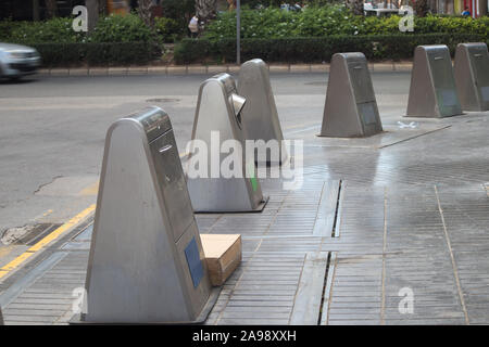 Nozzles of underground containers to facilitate the separation of urban solid waste in a small town Stock Photo