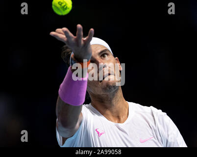 London, UK. 13th Nov, 2019. Rafael Nadal of Spain serves during the singles group match against Daniil Medvedev of Russia at the ATP World Tour Finals 2019 in London, Britain on Nov. 13, 2019. Credit: Han Yan/Xinhua/Alamy Live News Stock Photo