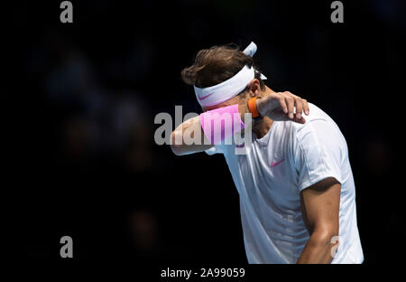 London, UK. 13th Nov, 2019. Rafael Nadal of Spain reacts during the singles group match against Daniil Medvedev of Russia at the ATP World Tour Finals 2019 in London, Britain on Nov. 13, 2019. Credit: Han Yan/Xinhua/Alamy Live News Stock Photo