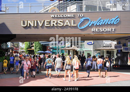 Theme Park Entrance and Sign, People Entering, Walking, Universal Orlando Resort, Universal Studios, Florida, USA Stock Photo