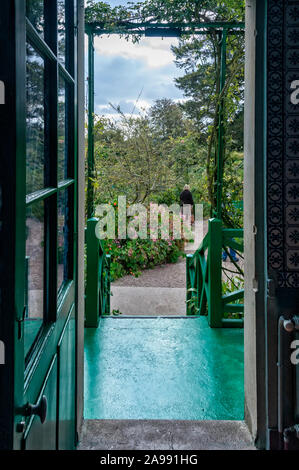 Garden view through open doorway. Stock Photo