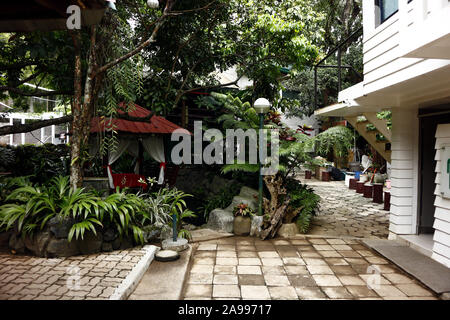 ANTIPOLO CITY, PHILIPPINES - NOVEMBER 13, 2019: Beautiful outdoor garden of a popular tourist destination resort in Antipolo City, Philippines. Stock Photo