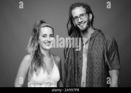 Studio shot of young Hispanic couple together in black and white Stock Photo