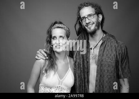 Studio shot of young Hispanic couple together in black and white Stock Photo