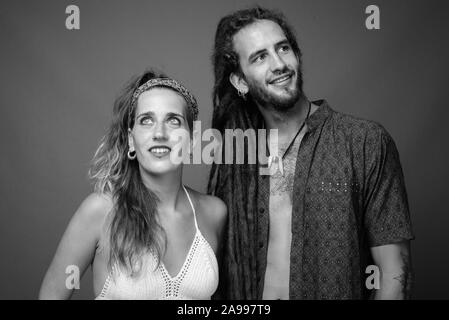 Studio shot of young Hispanic couple together in black and white Stock Photo