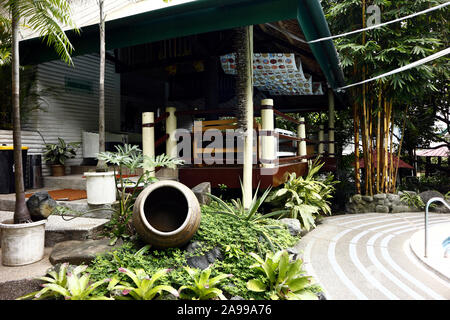 ANTIPOLO CITY, PHILIPPINES - NOVEMBER 13, 2019: Beautiful outdoor garden of a popular tourist destination resort in Antipolo City, Philippines. Stock Photo