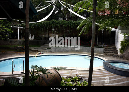 ANTIPOLO CITY, PHILIPPINES - NOVEMBER 13, 2019: Beautiful outdoor garden of a popular tourist destination resort in Antipolo City, Philippines. Stock Photo