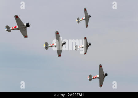 Aircraft from the flight team 'Tora! Tora! Tora!', T-6 Texans painted as Japanese Zeroes, perform at the 2012 Dayton Airshow. Stock Photo