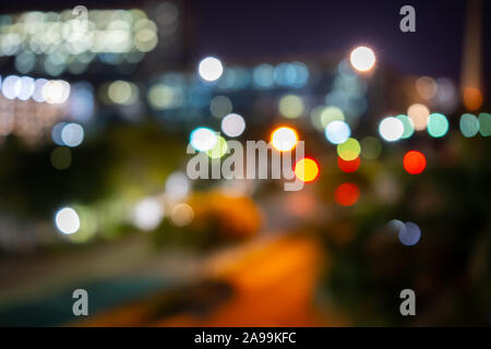 Defocused colourful city lights at night Stock Photo