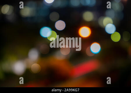 Defocused colourful city lights at night Stock Photo
