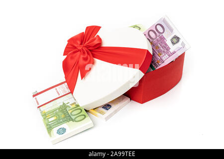 Heart gift box and bow with money Stock Photo