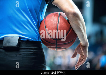 Basketball referee with the ball Stock Photo