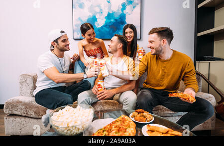 Happy friends drinking ganzberg beer enjoying time together Stock Photo