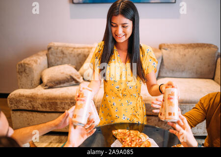 Happy friends drinking ganzberg beer enjoying time together Stock Photo