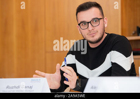 Stuttgart, Germany. 14th Nov, 2019. Ruzhdi Canaj, a geriatric care specialist with a Kosovan background, takes part in a press conference of Diakonie. Since 2015, more than 260 young Kosovars have begun training in nursing care for the elderly at Baden-Württembergische Diakonie, the welfare association of the Protestant Church. Credit: Tom Weller/dpa/Alamy Live News Stock Photo